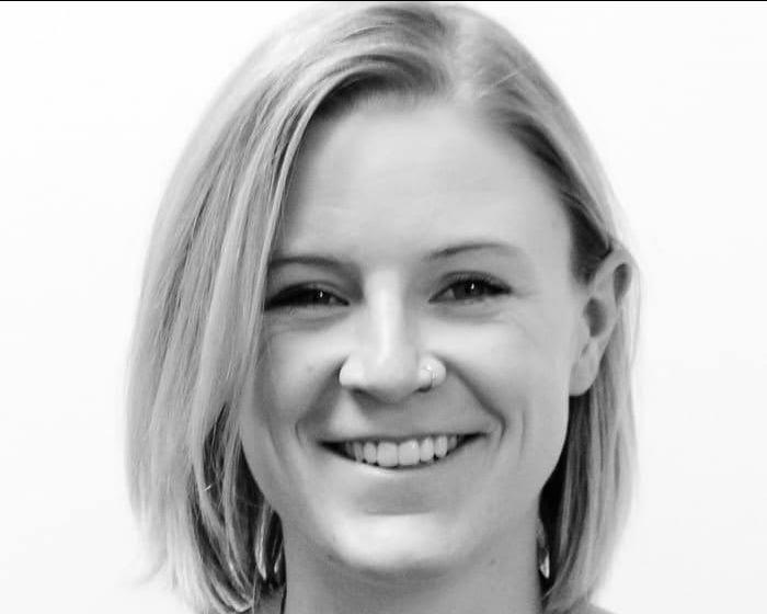 Faith Overall smiling, pictured in a black and white photo