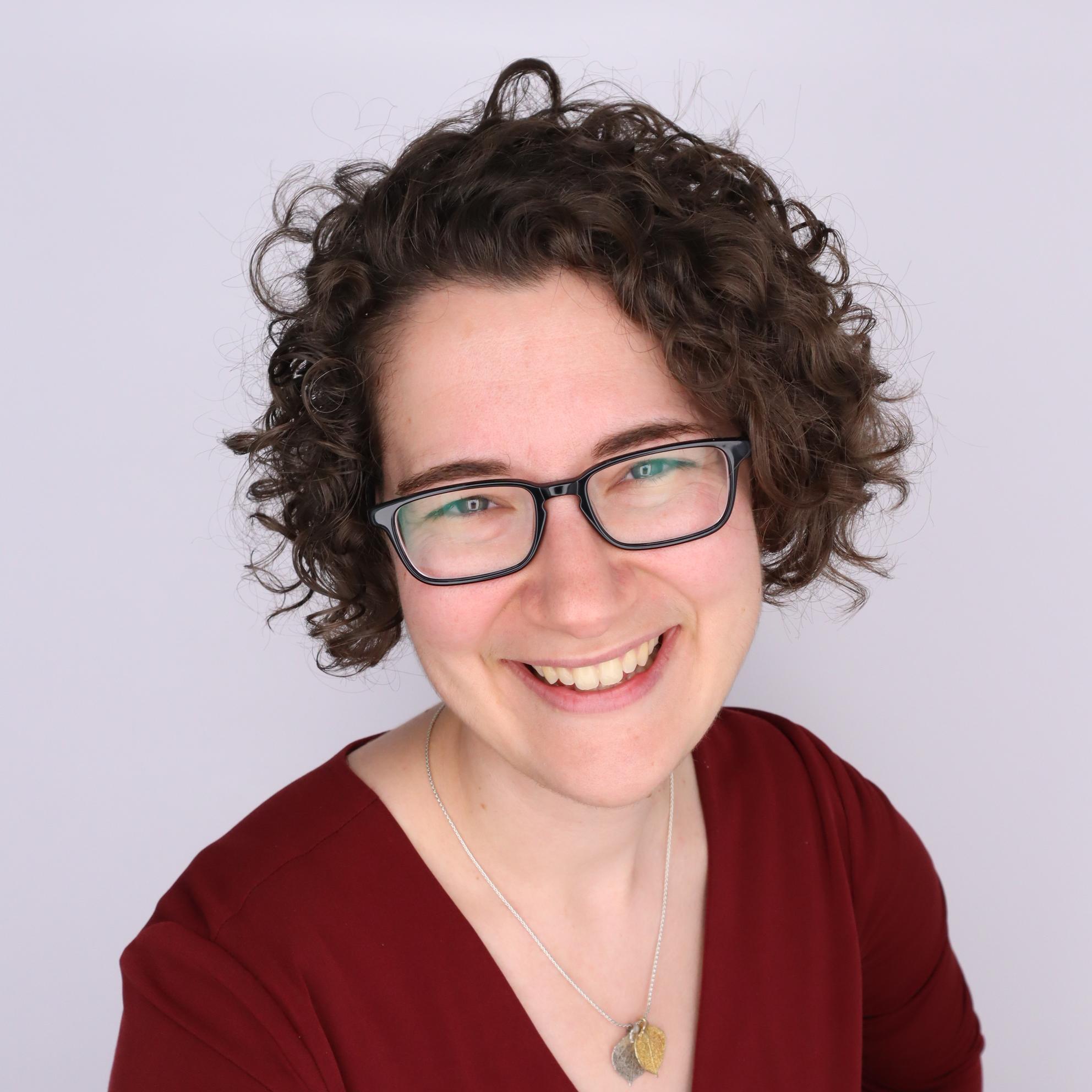 Headshot of Quina Weber-Shirk