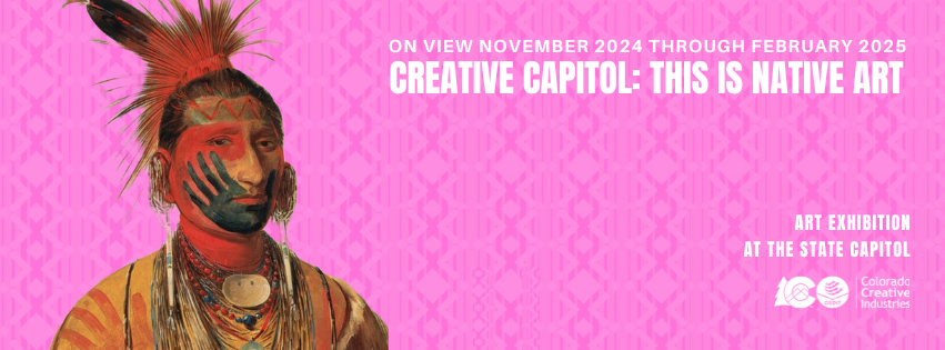 a painted Native American wearing traditional regalia and a black hand over their face. The background is hot pinkwith a snake-like pattern.