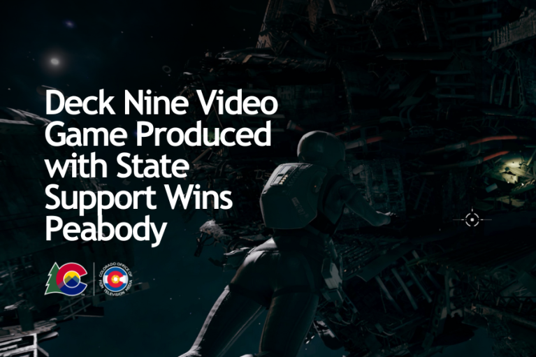Video game character on a very dark background, with the text overlay saying "Deck Nine Video Game Produced with State Support Wins Peabody"