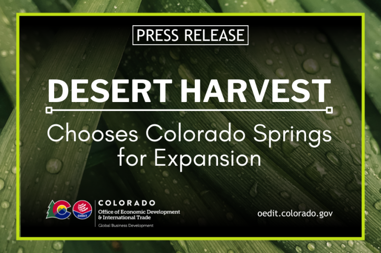 Press Release graphic stating "press release Desert Harvest chooses Colorado Springs for expansion" Words are in front of an image showing aloe vera plants