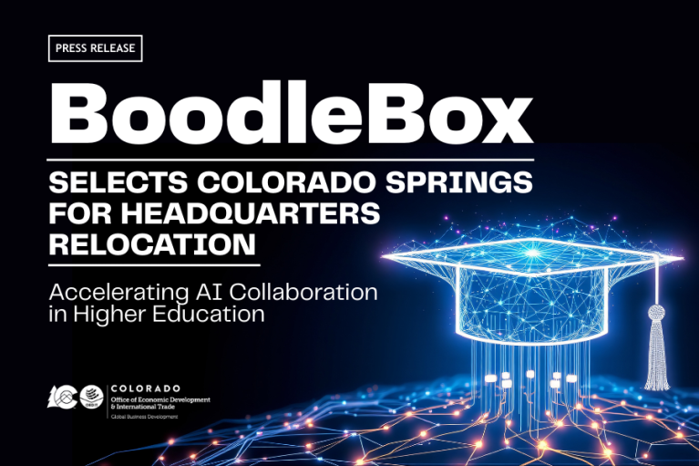 Press release image announcing BoodleBox selects Colorado Springs for headquarters relocation, featuring a digital illustration of a graduation cap outlined in neon blue lights. 