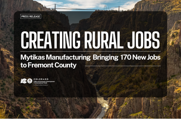 Press release graphic stating: "Creating Rural Jobs: Mytikas Manufacturing Bringing 170 New Jobs to Fremont County" words are in front of a view from the bottom of the Royal Gorge in Canon City, CO