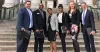 Six FirstBank employees smiling and standing in front of Colorado's capital building