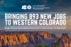 Press release graphic from the Colorado Office of Economic Development and International Trade. The image features a landscape view of Colorado National Monument at sunset with text announcing "Bringing 893 new jobs to Western Colorado" “Morgan Mining to expand the manufacturing industry in Grand Junction and Mesa County.”